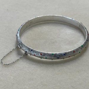 Sterling silver bangle with emerald, sapphire and ruby chips